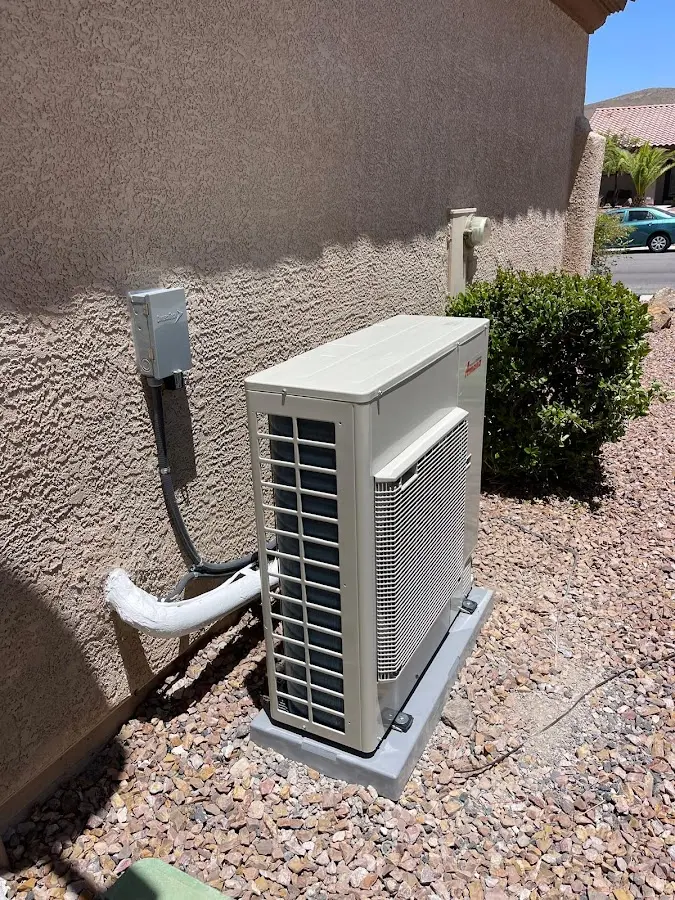 Residential air conditioning condenser unit in Linwood